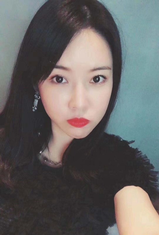李莉的第二张照片--龙海婚介网