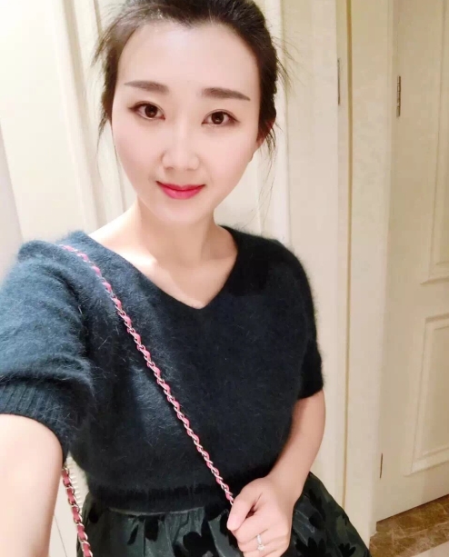 小妮的第三张照片--龙海婚介网