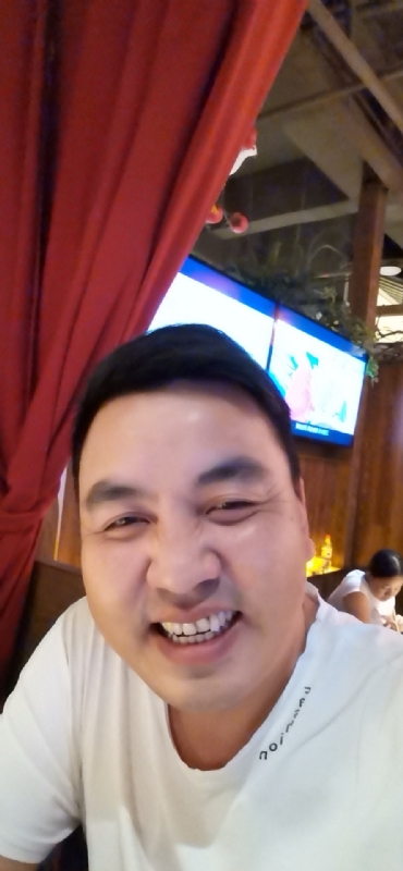 泉哥的第一张照片--龙海婚介网