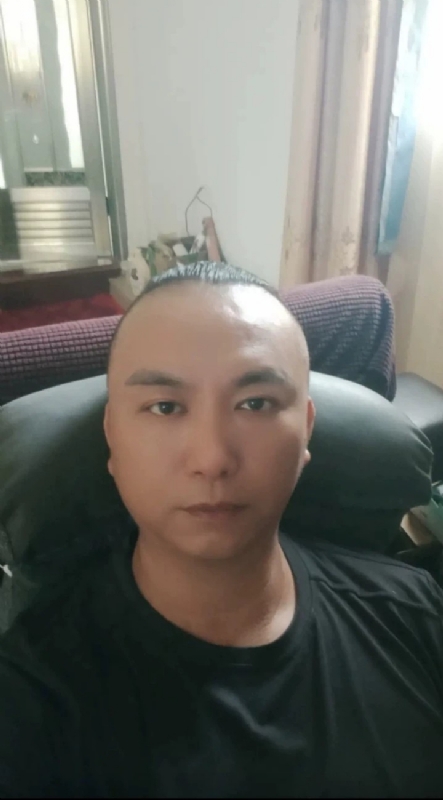 施逸森的第一张照片--龙海婚介网
